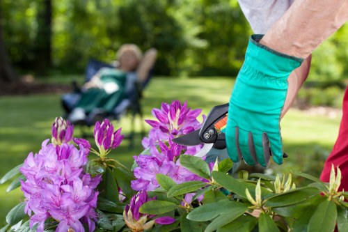 Stylish garden renovation in Chessington featuring paths, planting, and seating zones