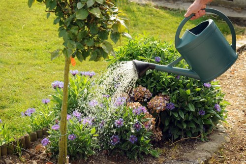 Local landscapers shaping a modern outdoor space in Chessington